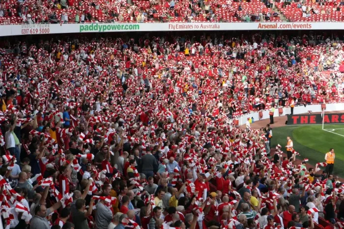 Framed Print : Arsenal Fans Unite: Scarves Raised in Triumph at Emirates Stadium (4:1 Win over Portsmouth, Barclays Premier League, 2009)