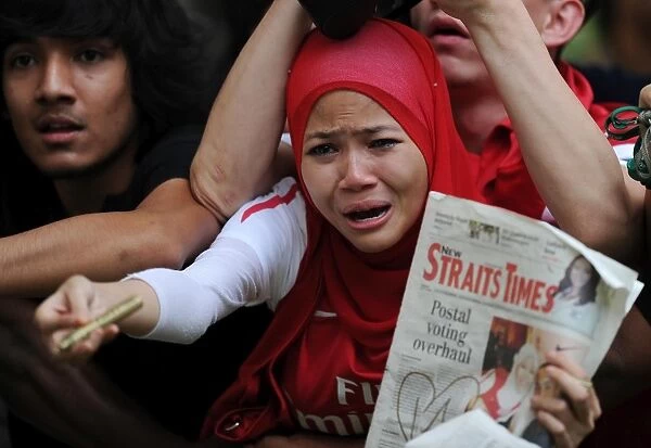 Arsenal Fans Unite: A Sea of Red at Suajuna Hotel, Kuala Lumpur (2011)