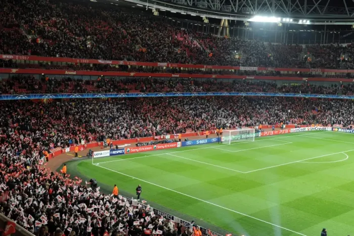 Framed Print : Arsenal Fans Unite: Waving Flags Before the Epic Arsenal 2:1 Barcelona UEFA Champions League Match, Emirates Stadium Framed Print : Arsenal Fans Unite: Waving Flags Before the Epic Arsenal 2:1 Barcelona UEFA Champions League Match, Emirates Stadium
