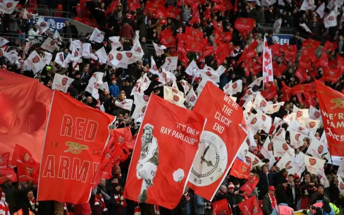 Framed Print : Arsenal Fans Unite at Wembley: Carabao Cup Final Showdown Against Manchester City - A Sea of Arsenal Flags