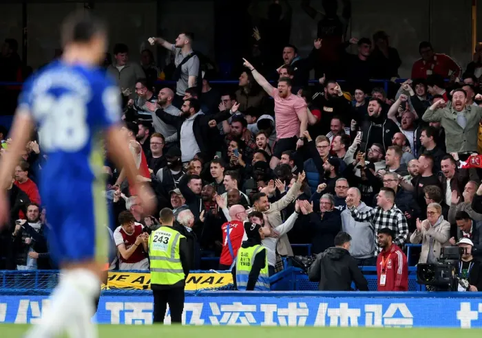 Framed Print : Arsenal Fans Unwavering Passion: A Sea of Red and White at Stamford Bridge during Chelsea vs Arsenal, Premier League 2021-22