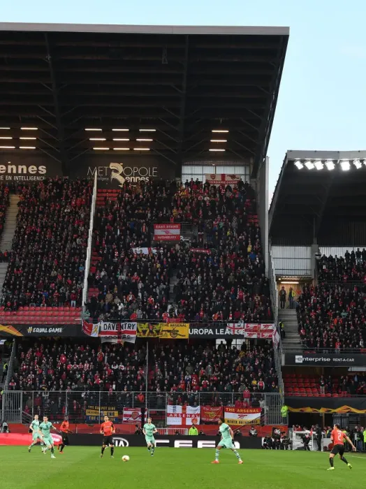Framed Print : Arsenal Fans Unwavering Passion at Stade Rennais: UEFA Europa League 2018-19 Round of 16 First Leg