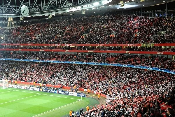 The Arsenal fans wave their flags before the match. Arsenal 2: 1 Barcelona