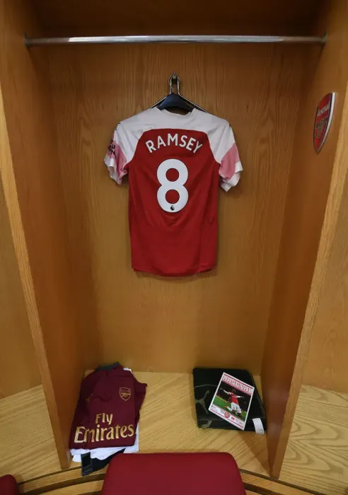 Framed Print : Arsenal FC: Aaron Ramsey's Empty Jersey in the Changing Room Before Arsenal v Watford (2018-19)