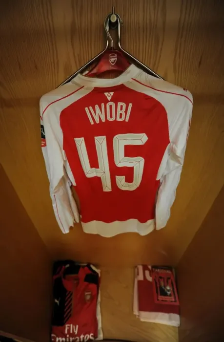 Framed Print : Arsenal FC: Alex Iwobi's Pre-Match Focus in the Home Changing Room (FA Cup: Arsenal vs Hull City) Framed Print : Arsenal FC: Alex Iwobi's Pre-Match Focus in the Home Changing Room (FA Cup: Arsenal vs Hull City)