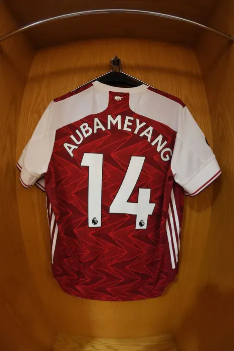 Framed Print : Arsenal FC: Aubameyang's Hanging Jersey in Emirates Stadium Changing Room (Arsenal v Watford 2019-20)