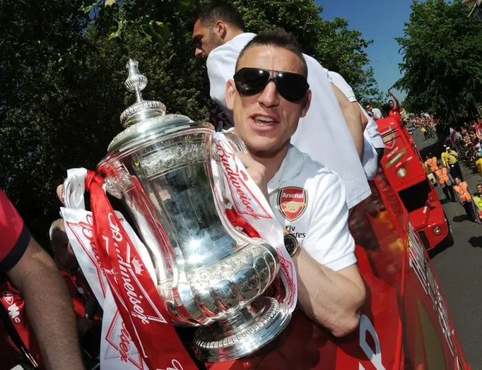 Framed Print : Arsenal FC: Celebrating FA Cup Victory - Laurent Koscielny's Triumphant Parade