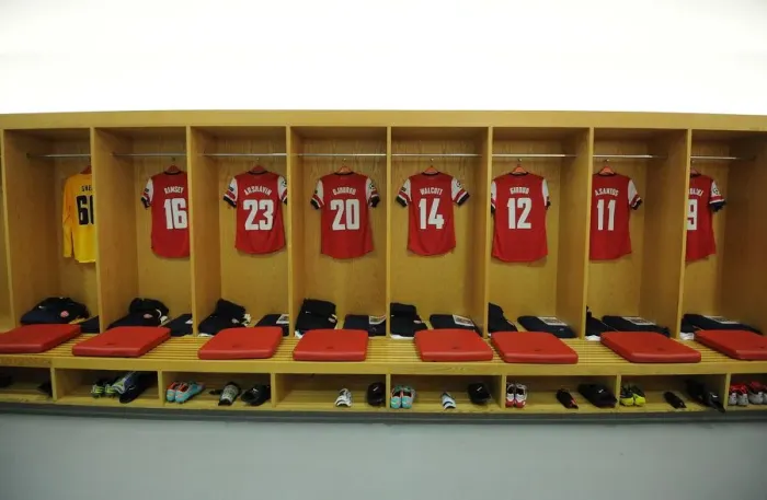 Framed Print : Arsenal FC Changing Room Before UEFA Champions League Match against Olympiacos (2012-13)