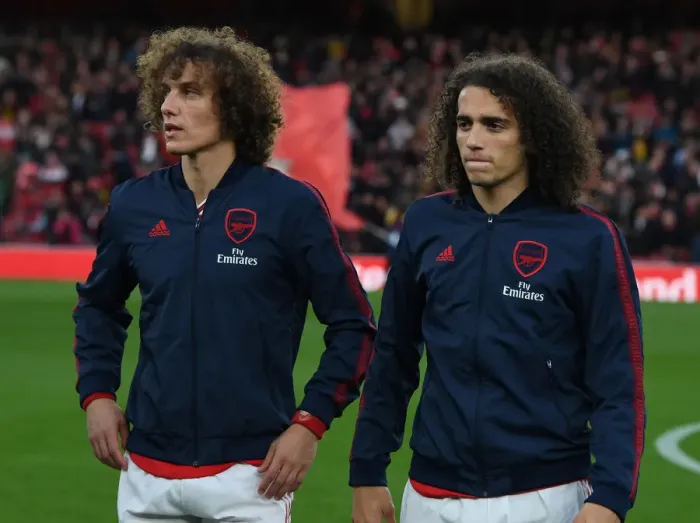 Framed Print : Arsenal FC: David Luiz and Matteo Guendouzi Pre-Match Huddle vs Crystal Palace (Premier League 2019-20) Framed Print : Arsenal FC: David Luiz and Matteo Guendouzi Pre-Match Huddle vs Crystal Palace (Premier League 2019-20)