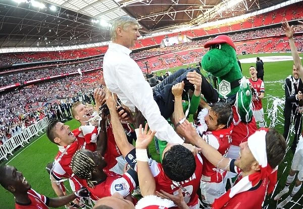 Arsenal FC: FA Cup Victory - Arsene Wenger's Triumphant Lift by the Squad