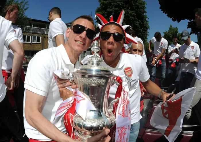 Framed Print : Arsenal FC: FA Cup Victory Parade - Celebrating with Koscielny and Gibbs, London 2014: Arsenal Trophy Parade with Laurent Koscielny and Kieran Gibbs