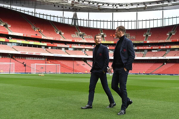Arsenal FC: Focused Moment before the Arsenal vs. Tottenham Clash (2018-19) - Lichtsteiner and Leno Prepare on the Pitch
