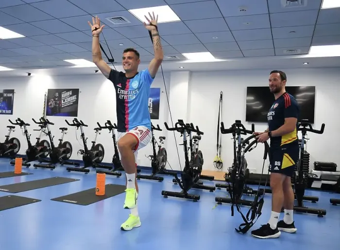 Framed Print : Arsenal FC: Granit Xhaka's Pre-Match Training with Barry Solan before Arsenal vs AC Milan, Dubai Super Cup 2022-23