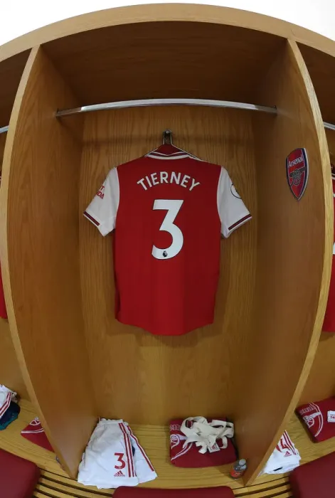 Framed Print : Arsenal FC: Kieran Tierney's Shirt in Emirates Changing Room (Arsenal v AFC Bournemouth, 2019-20)