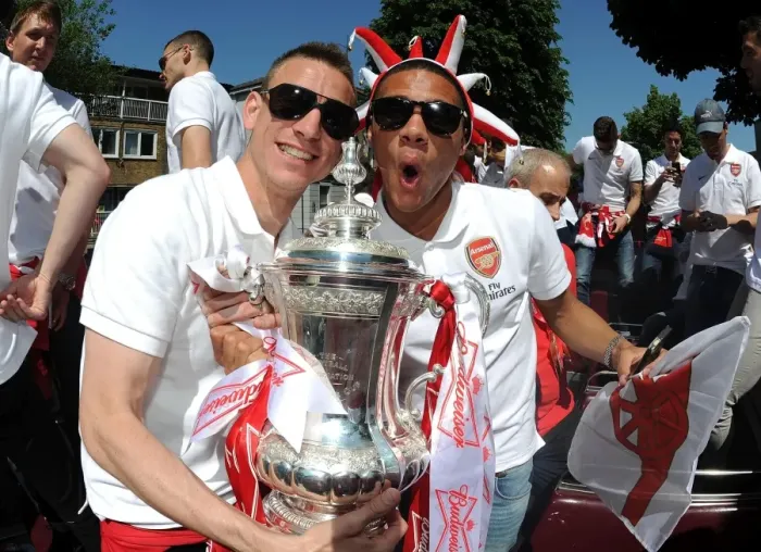 Framed Print : Arsenal FC: Laurent Koscielny and Kieran Gibbs Celebrate FA Cup Victory during the 2014 Parade Framed Print : Arsenal FC: Laurent Koscielny and Kieran Gibbs Celebrate FA Cup Victory during the 2014 Parade