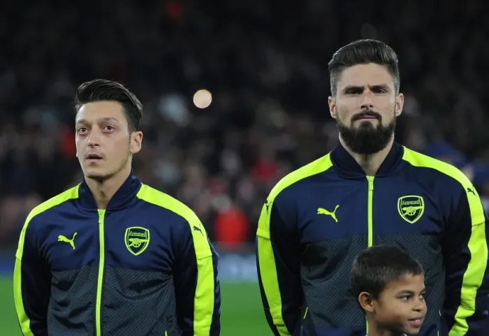 Framed Print : Arsenal FC: Ozil and Giroud Sharing a Pre-Match Moment before Arsenal vs Paris Saint-Germain, 2016-17 UEFA Champions League