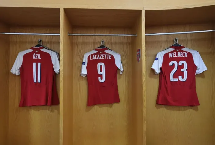 Framed Print : Arsenal FC: Ozil, Lacazette, and Welbeck's Empty Jerseys in the Home Changing Room Ahead of Atletico Madrid Clash (UEFA Europa League Semi-Final Leg One)
