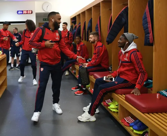 Framed Print : Arsenal FC: Pre-Match Huddle - Lacazette and Maitland-Niles in the Changing Room (Arsenal v Southampton, 2019-20)