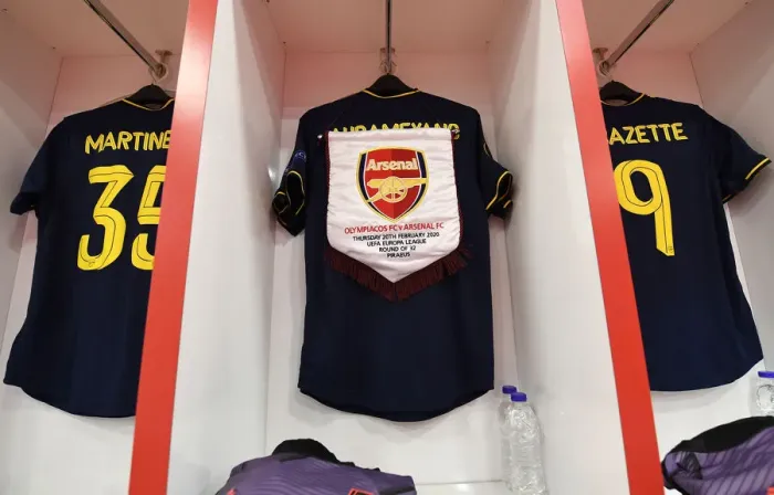 Framed Print : Arsenal FC: Pre-Match Huddle in Olympiacos Changing Room - UEFA Europa League 2019-20: Round of 32, First Leg