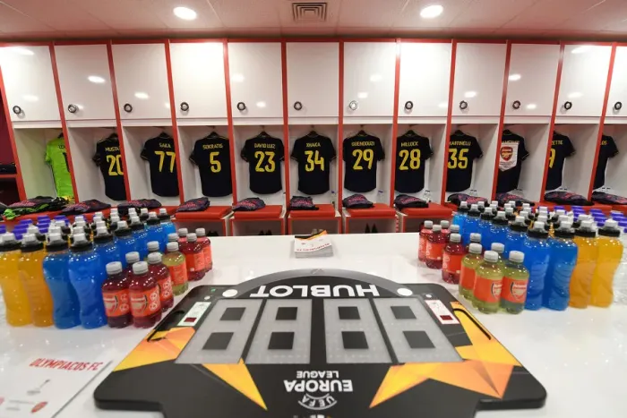Framed Print : Arsenal FC: Pre-Match Huddle in Olympiacos's Changing Room - UEFA Europa League 2019-20: Round of 32, First Leg