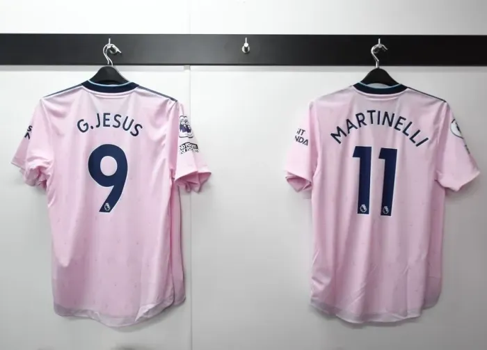 Framed Print : Arsenal FC: Pre-Match Preparation - Gabriel Jesus and Martinelli's Shirts in the Changing Room (2022-23)