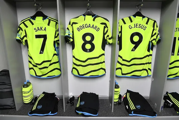 Framed Print : Arsenal FC: Pre-Match Shirts of Saka, Odegaard, and Jesus in Luton Town Dressing Room (Luton Town vs Arsenal 2023-24)