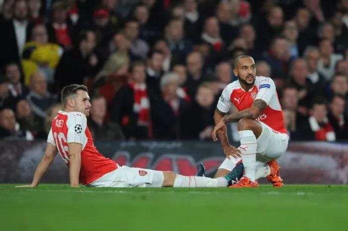 Framed Print : Arsenal FC: Theo Walcott Comforts Injured Aaron Ramsey during the Arsenal vs. FC Bayern Munich UCL Clash (2015 / 16) Framed Print : Arsenal FC: Theo Walcott Comforts Injured Aaron Ramsey during the Arsenal vs. FC Bayern Munich UCL Clash (2015 / 16)