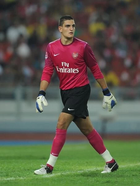 Arsenal FC Training in Malaysia: Vito Mannone in Action during Malaysia XI Friendly, 2012