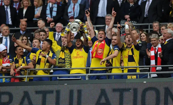 Framed Print : Arsenal FC Triumphs in FA Cup Final: Theo Walcott's Victory Dance (2015)