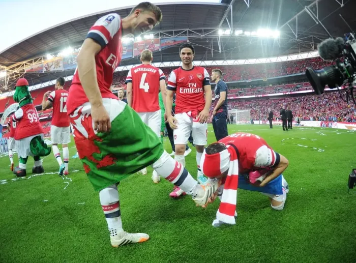 Framed Print : Arsenal FC: Unforgettable FA Cup Victory Celebration - Ramsey and Cazorla's Jubilant Moment Framed Print : Arsenal FC: Unforgettable FA Cup Victory Celebration - Ramsey and Cazorla's Jubilant Moment