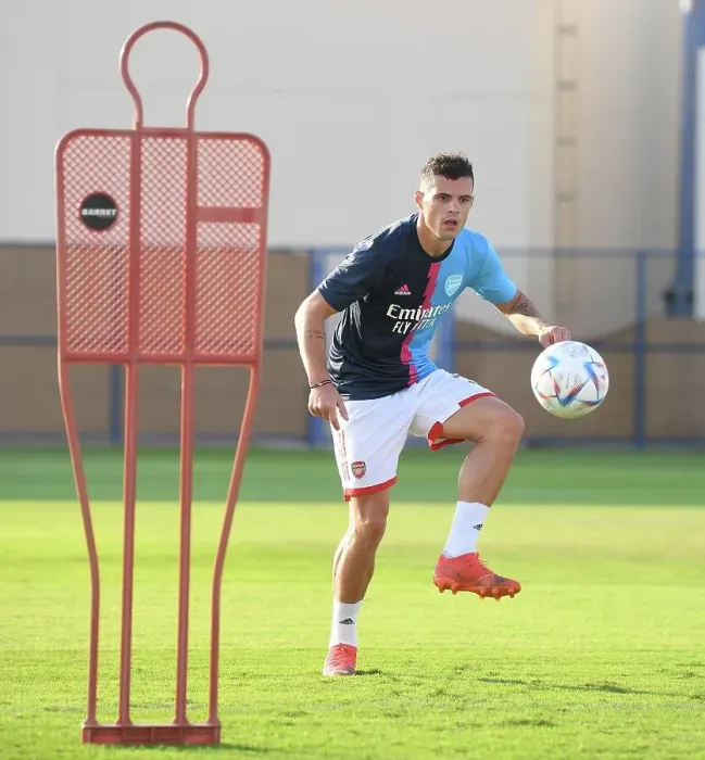 Framed Print : Arsenal FC vs AC Milan: Granit Xhaka Leads Arsenal Players in Training Before Dubai Super Cup Clash, 2022