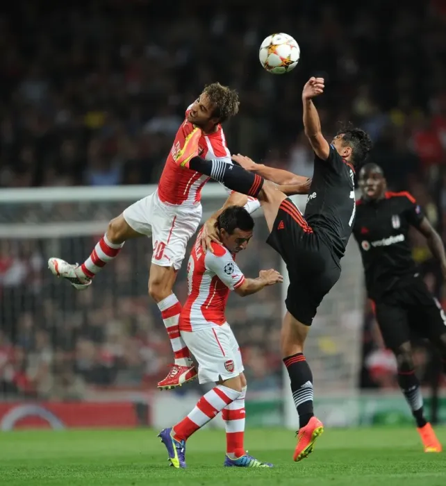 Framed Print : Arsenal FC vs Besiktas JK: Flamini and Cazorla Clash in UEFA Champions League Qualifier Framed Print : Arsenal FC vs Besiktas JK: Flamini and Cazorla Clash in UEFA Champions League Qualifier
