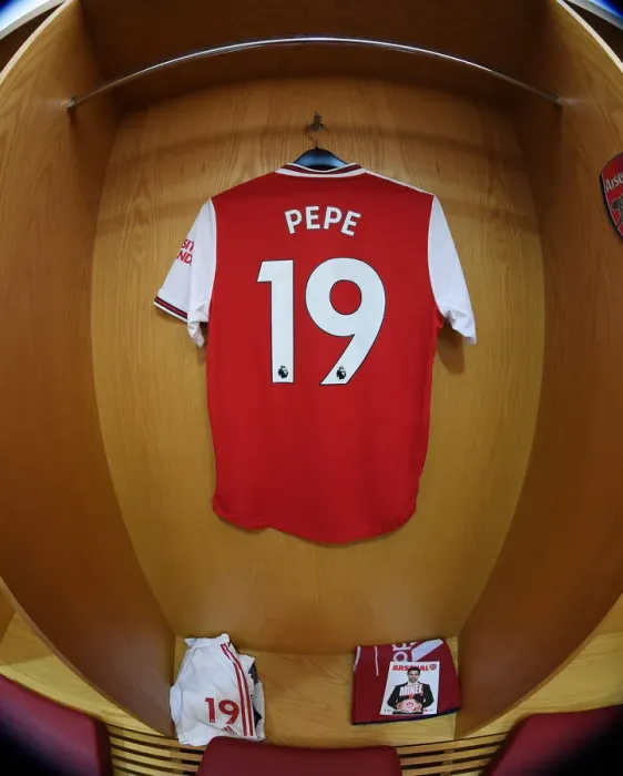 Framed Print : Arsenal FC vs Chelsea FC: Pre-Match Atmosphere - Nicolas Pepe's Jersey in Arsenal Changing Room (Arsenal v Chelsea 2019-20) Framed Print : Arsenal FC vs Chelsea FC: Pre-Match Atmosphere - Nicolas Pepe's Jersey in Arsenal Changing Room (Arsenal v Chelsea 2019-20)