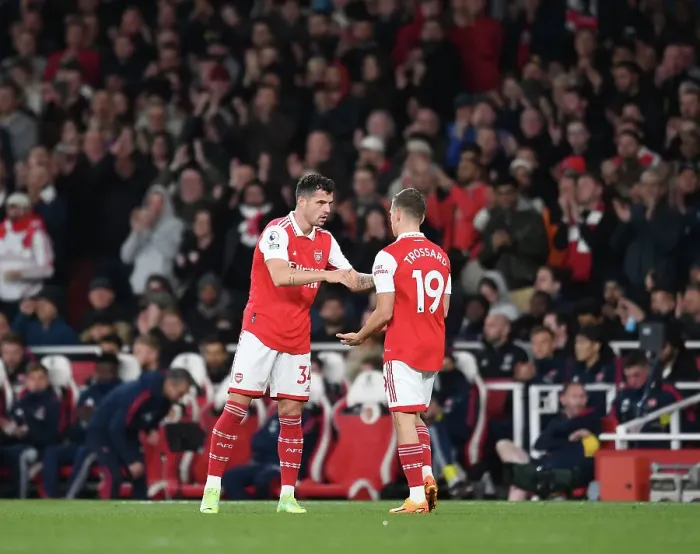 Framed Print : Arsenal FC vs Chelsea FC: Xhaka and Trossard in Action during the 2022-23 Premier League Clash at Emirates Stadium Framed Print : Arsenal FC vs Chelsea FC: Xhaka and Trossard in Action during the 2022-23 Premier League Clash at Emirates Stadium