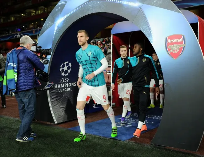 Framed Print : Arsenal FC vs. FC Barcelona: Per Mertesacker's Pre-Match Ritual - UEFA Champions League Round of 16, First Leg