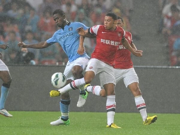 Arsenal FC vs Manchester City: Oxlade-Chamberlain vs Razak Clash in Beijing Pre-Season Friendly
