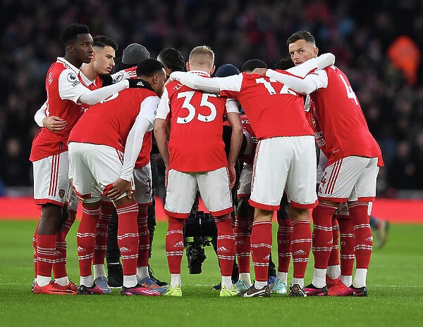 Arsenal FC vs Manchester United: Pre-Match Huddle - Arsenal's Nketiah and White Focused