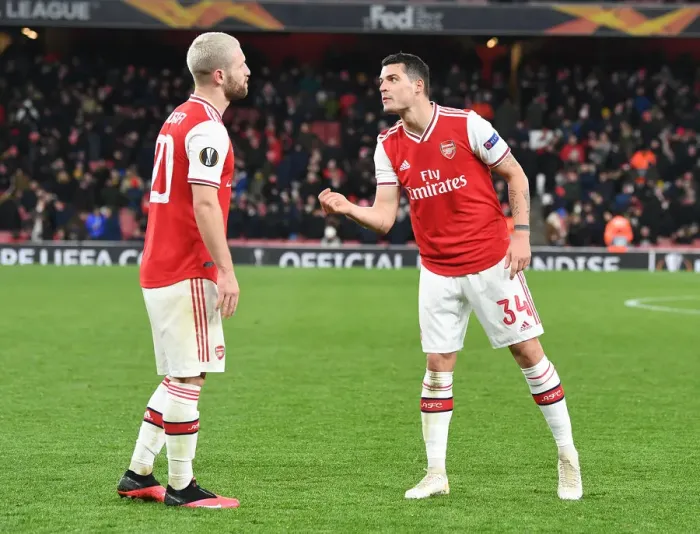 Framed Print : Arsenal FC vs Olympiacos FC: Europa League Clash - Mustafi and Xhaka in Action
