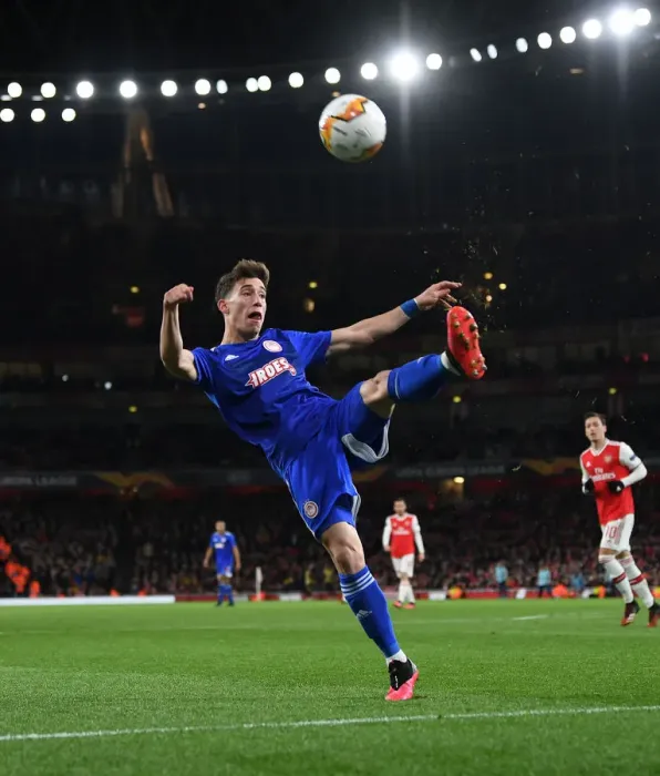 Framed Print : Arsenal FC vs Olympiacos FC: Kostas Tsimikas in Action - UEFA Europa League 2019-20 Round of 32, Second Leg