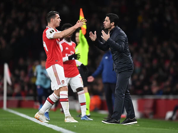 Arsenal FC vs Olympiacos FC: Mikel Arteta and Granit Xhaka Lead the Charge in UEFA Europa League Clash at Emirates Stadium