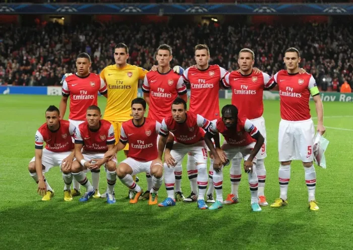 Framed Print : Arsenal FC vs Olympiacos FC - UEFA Champions League Showdown at Emirates Stadium (2012-13)