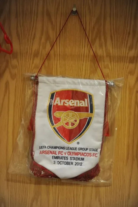 Framed Print : Arsenal FC vs Olympiacos FC: UEFA Champions League Showdown at Emirates Stadium (2012-13)