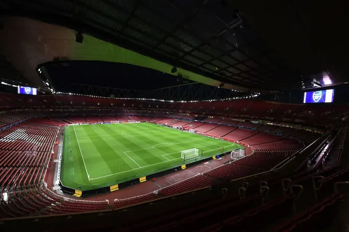Framed Print : Arsenal FC vs Sevilla FC: A Peek into the Electric Atmosphere of Emirates Stadium during the UEFA Champions League Match, 2023 / 24