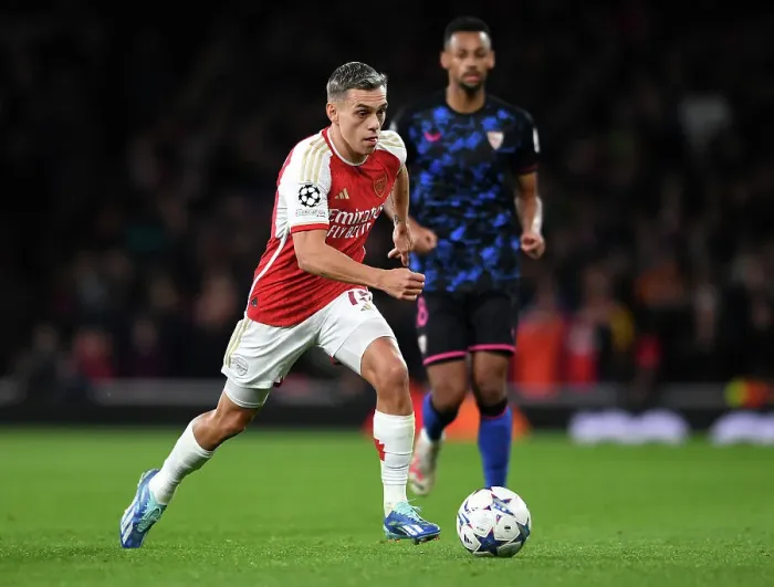 Framed Print : Arsenal FC vs Sevilla FC: Trossard Dashes Through Emirates Stadium in 2023-24 UEFA Champions League