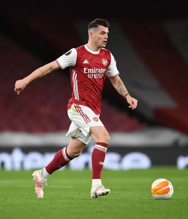 Framed Print : Arsenal FC vs Slavia Praha: Granit Xhaka in UEFA Europa League Quarterfinal at Emptied Emirates Stadium