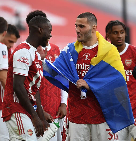 Arsenal FC: Empty Wembley - Kolasinac and Pepe Celebrate FA Cup Victory Amidst Pandemic