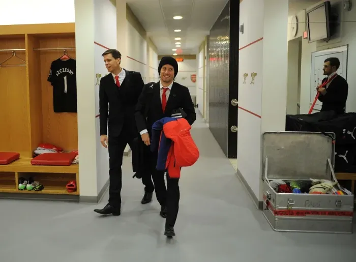 Framed Print : Arsenal FC: Wojciech Szczesny and Tomas Rosicky in the Home Changing Room before Arsenal vs. Queens Park Rangers (2014-15)
