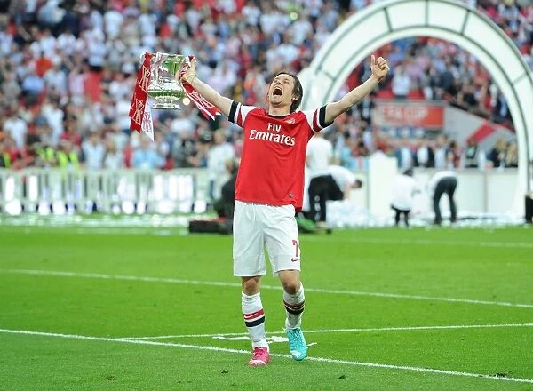 Arsenal FC's FA Cup Victory: Tomas Rosicky and the Triumphant FA Cup Trophy