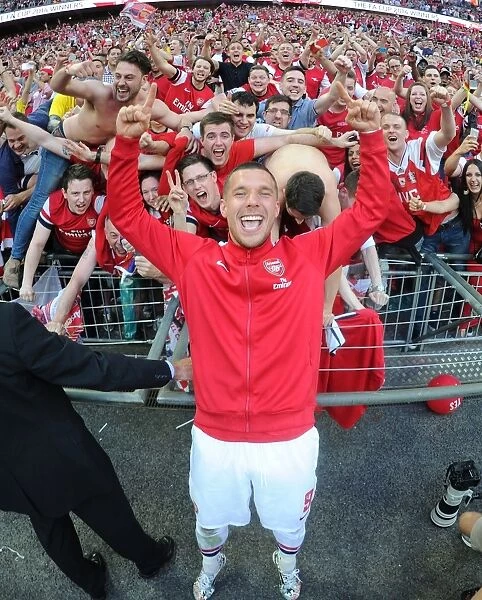 Arsenal FC's Unforgettable FA Cup Victory: Celebrating with Fans after Defeating Hull City (2014)