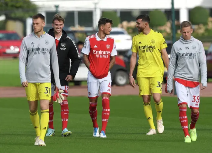 Framed Print : Arsenal First Team Squad 2022-23: Rob Holding, Ben White, and Matt Turner